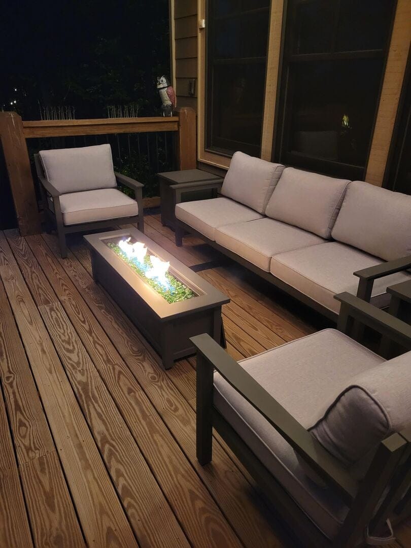 Patio furniture with fire pit.