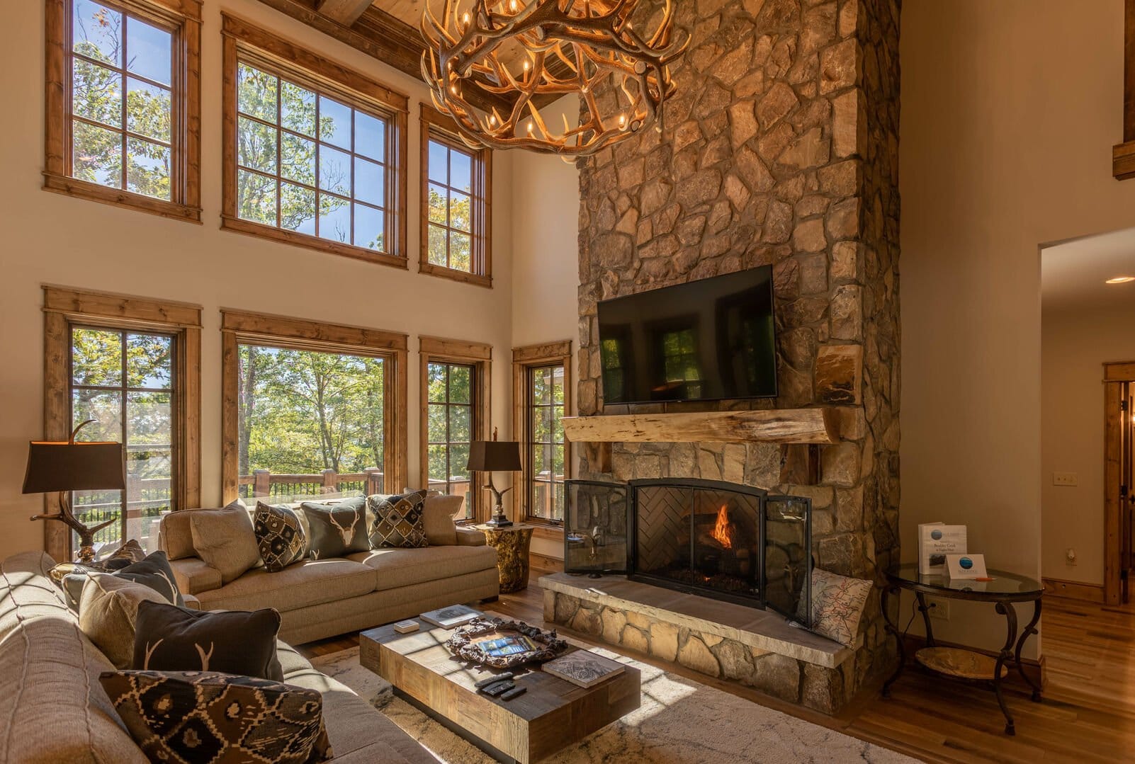 Rustic living room, stone fireplace.