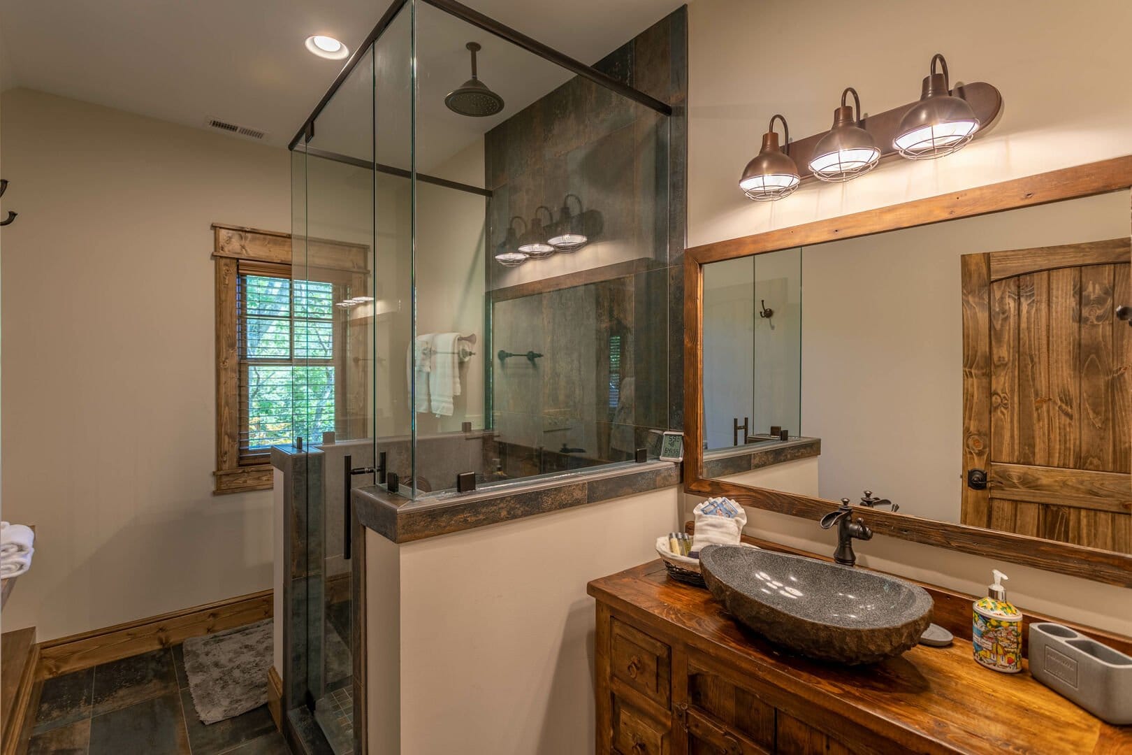 Rustic bathroom with stone sink.