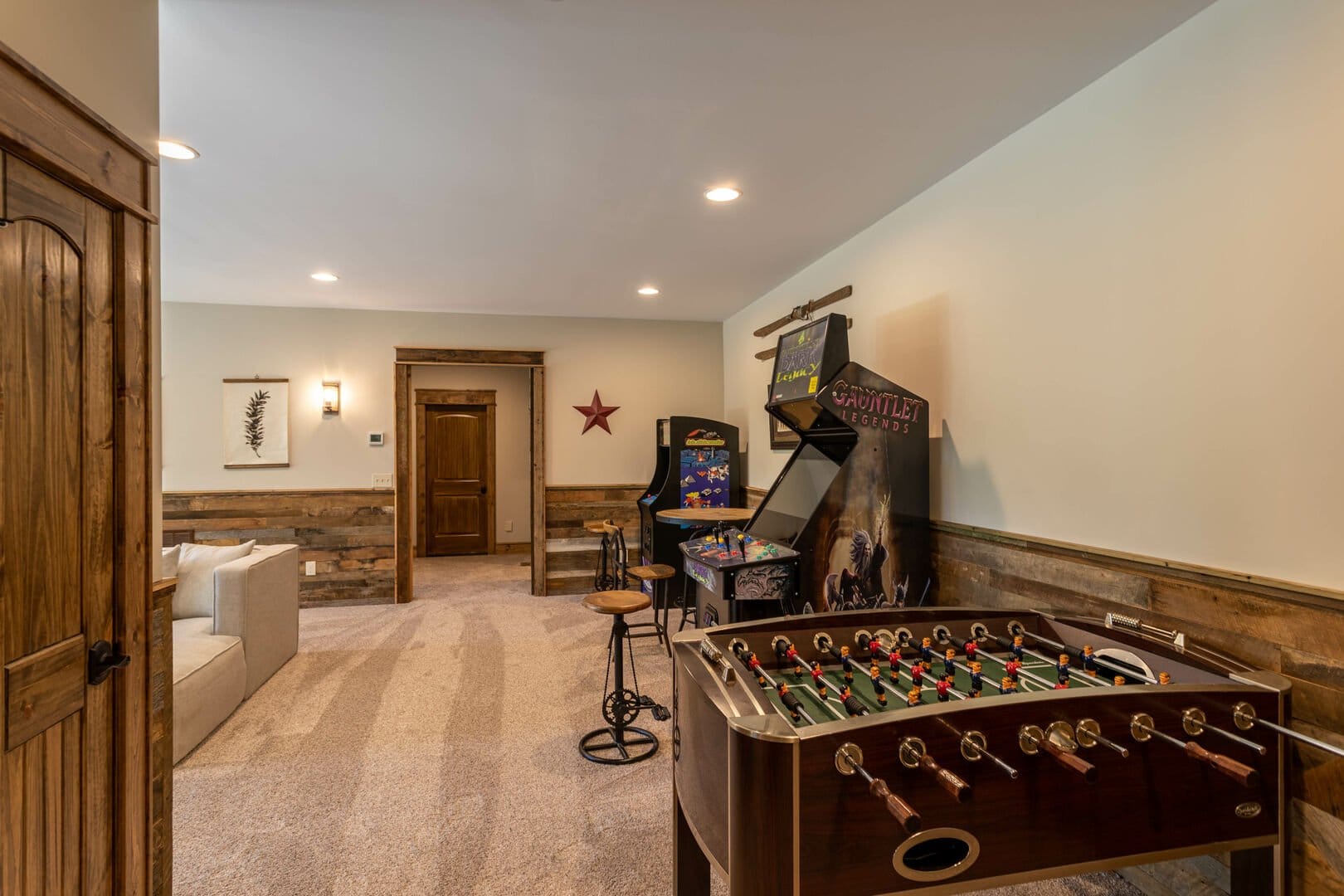 Game room with arcade machines.