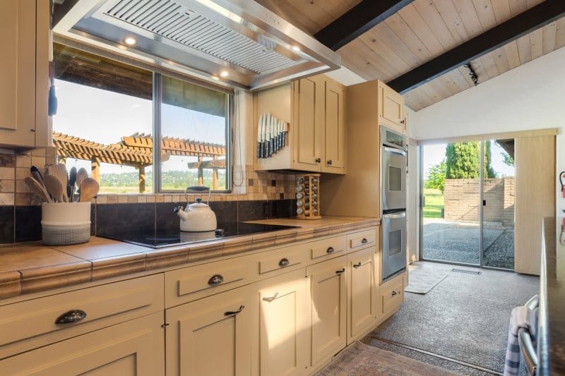 Modern kitchen with outdoor view.