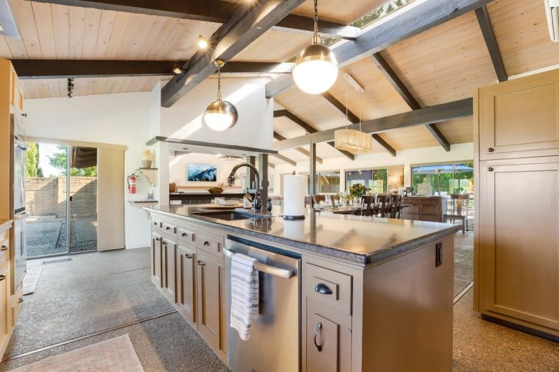 Spacious kitchen with wooden beams.