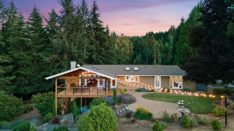 House with garden at sunset.