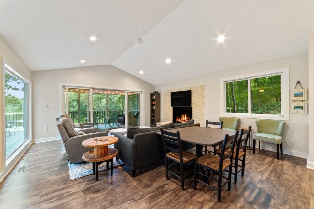 Modern living room with large windows.