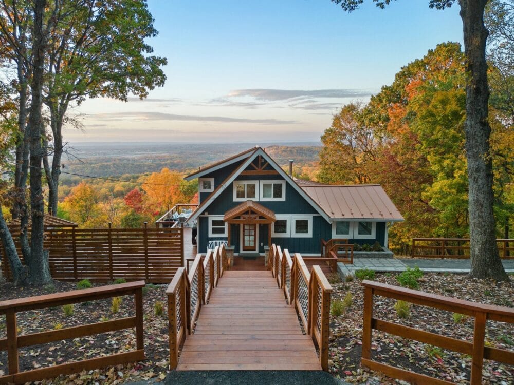 House with autumn forest view.