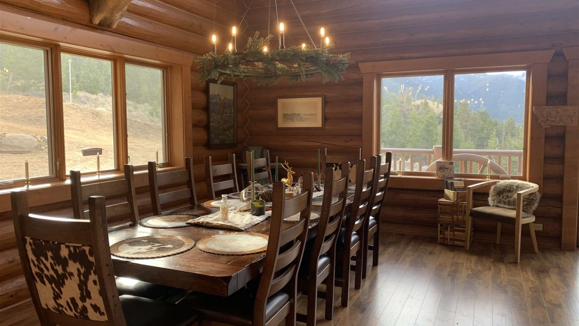 Rustic dining room with chandelier.