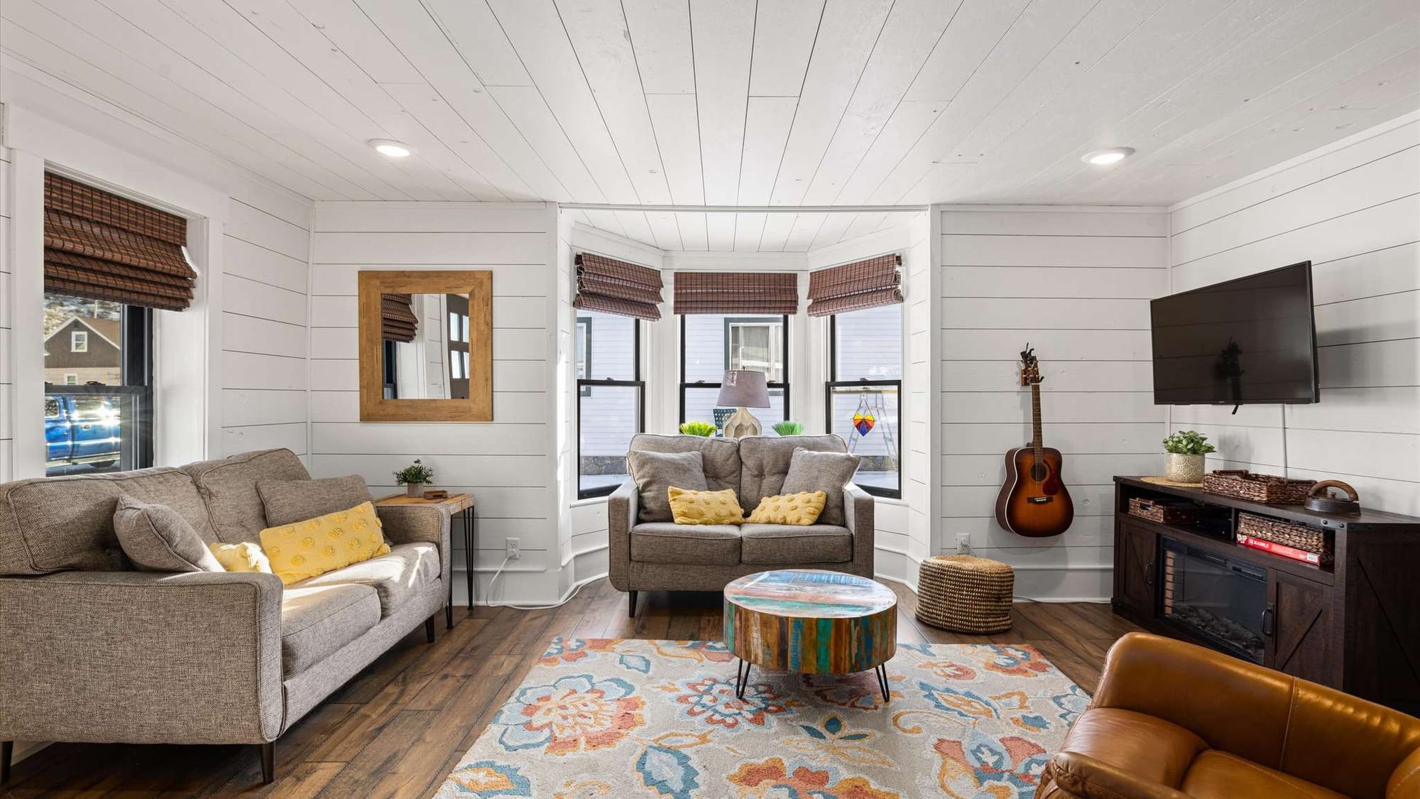 Cozy living room with guitar.