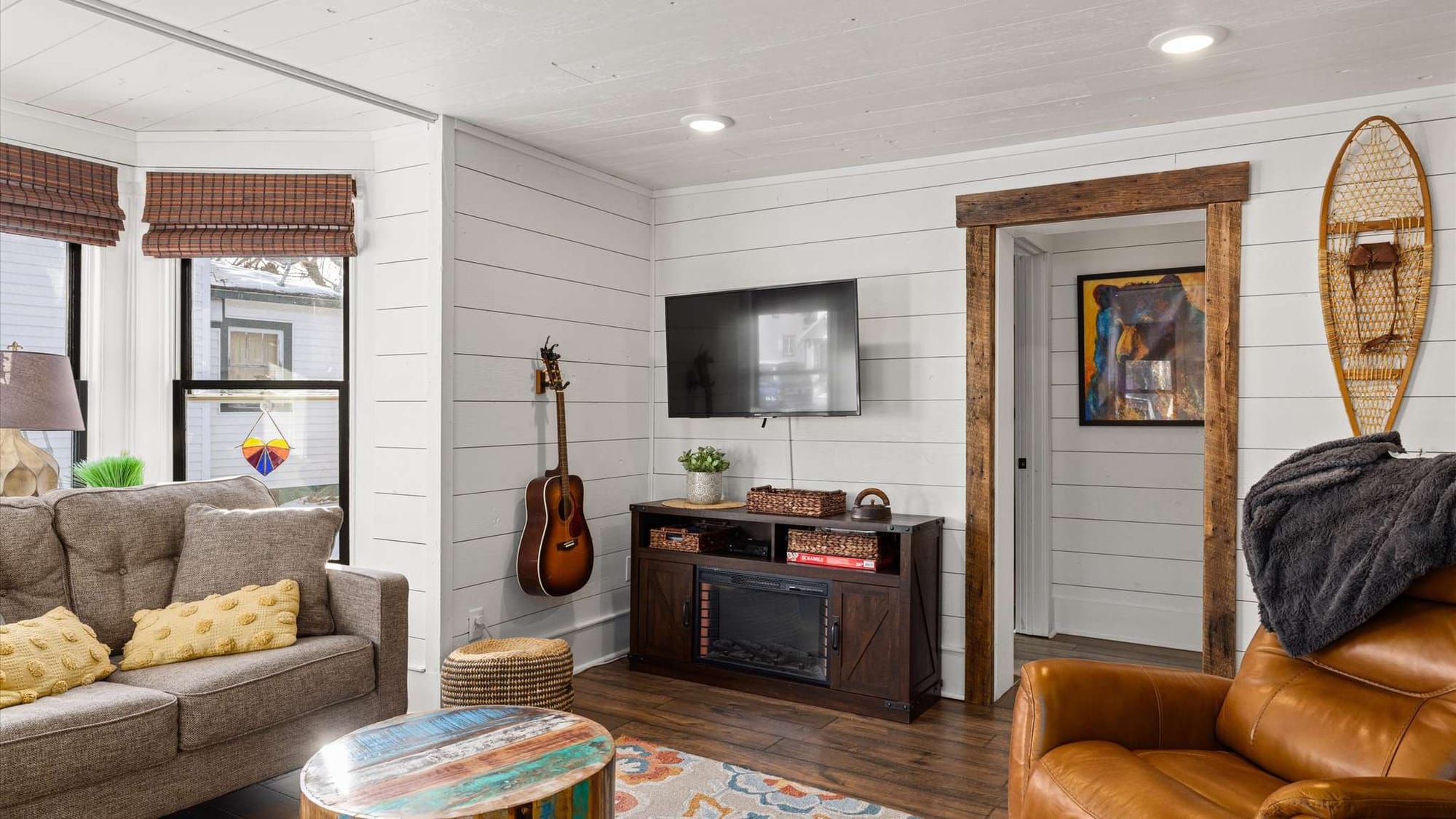 Cozy living room with guitar.