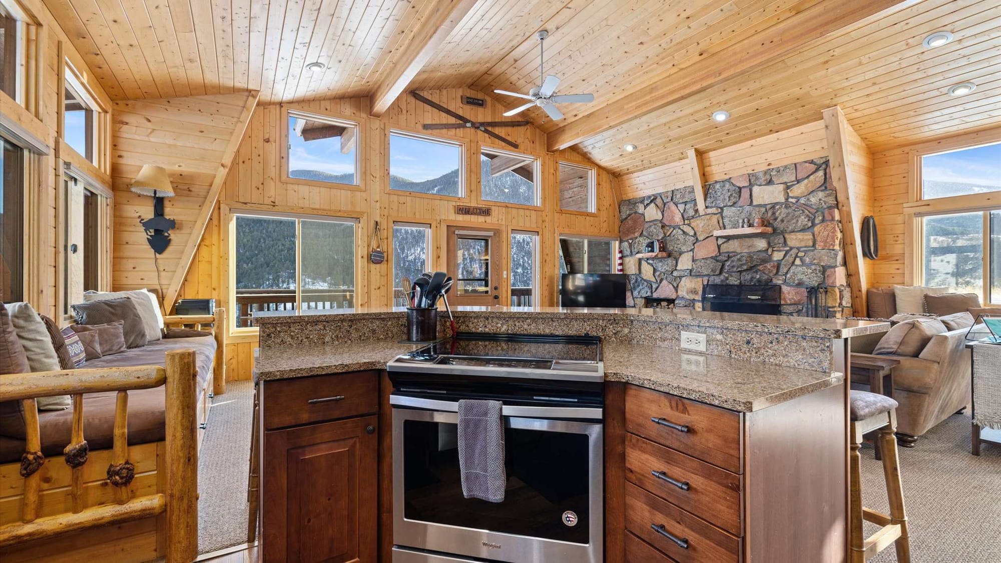 Cozy cabin interior with kitchen.