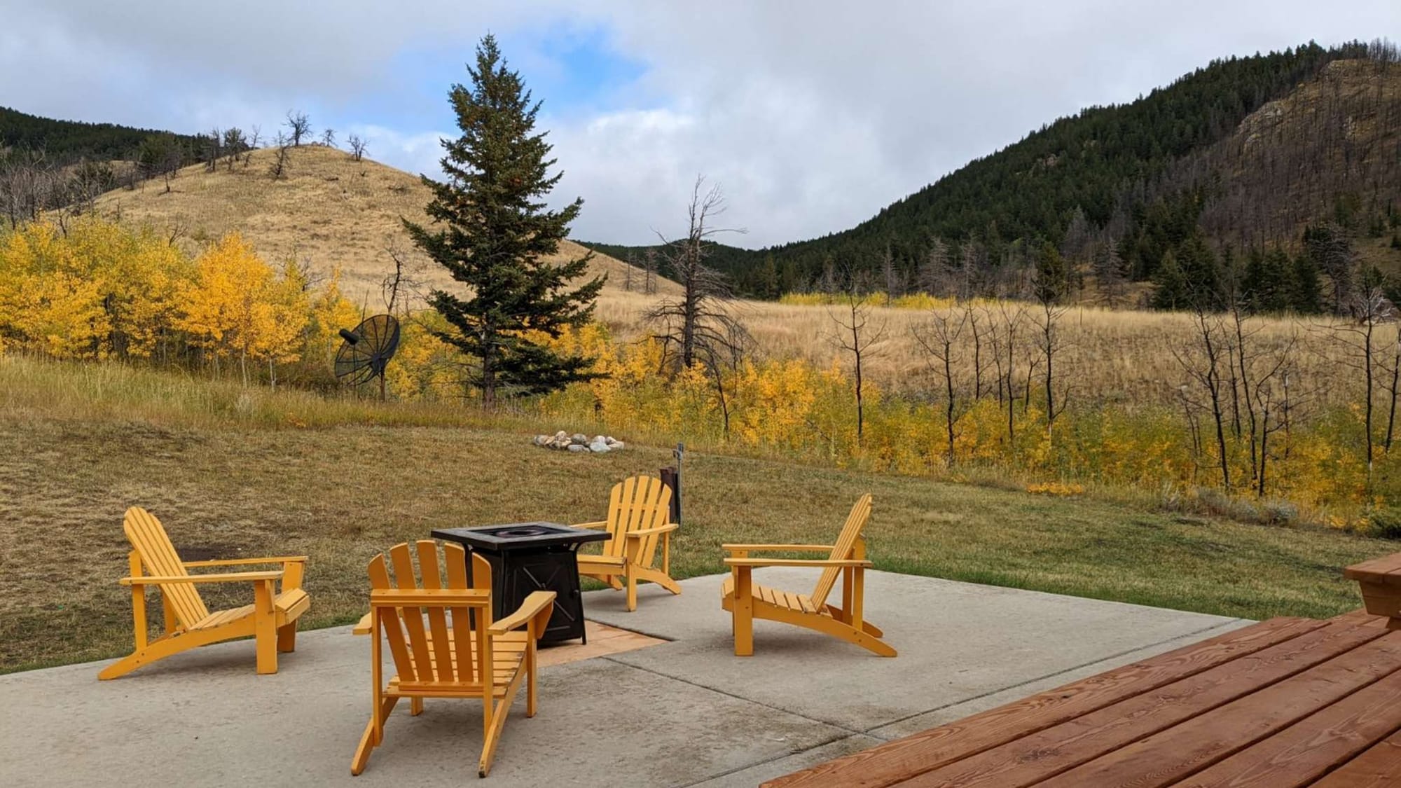 Chairs on patio, scenic view.