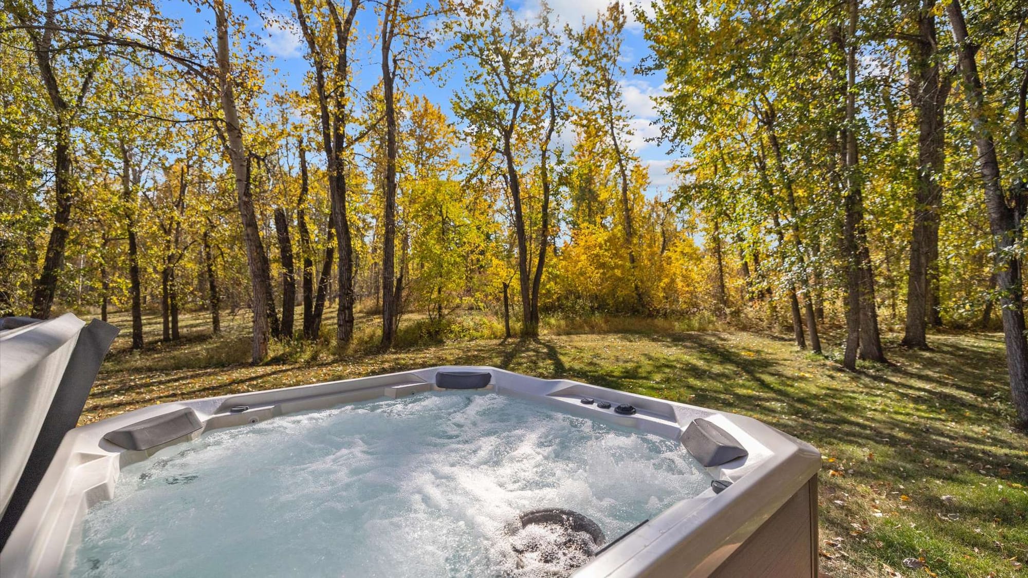 Hot tub with forest view.