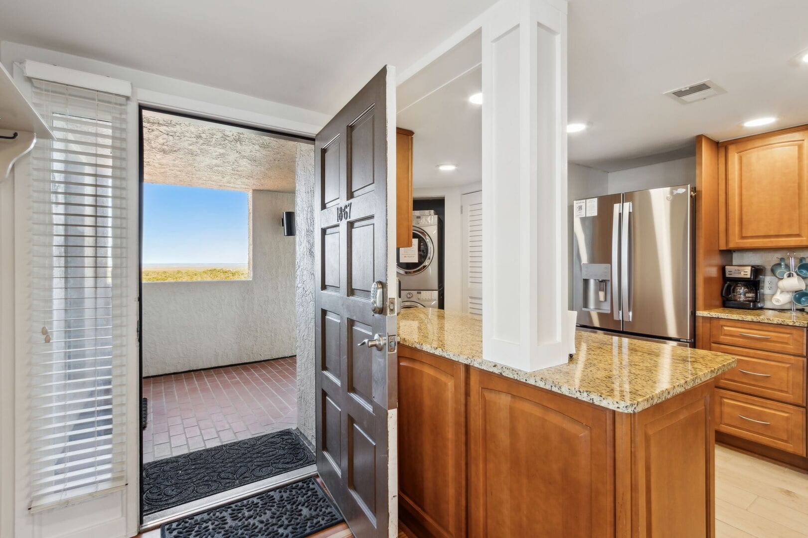 Open door to kitchen area.