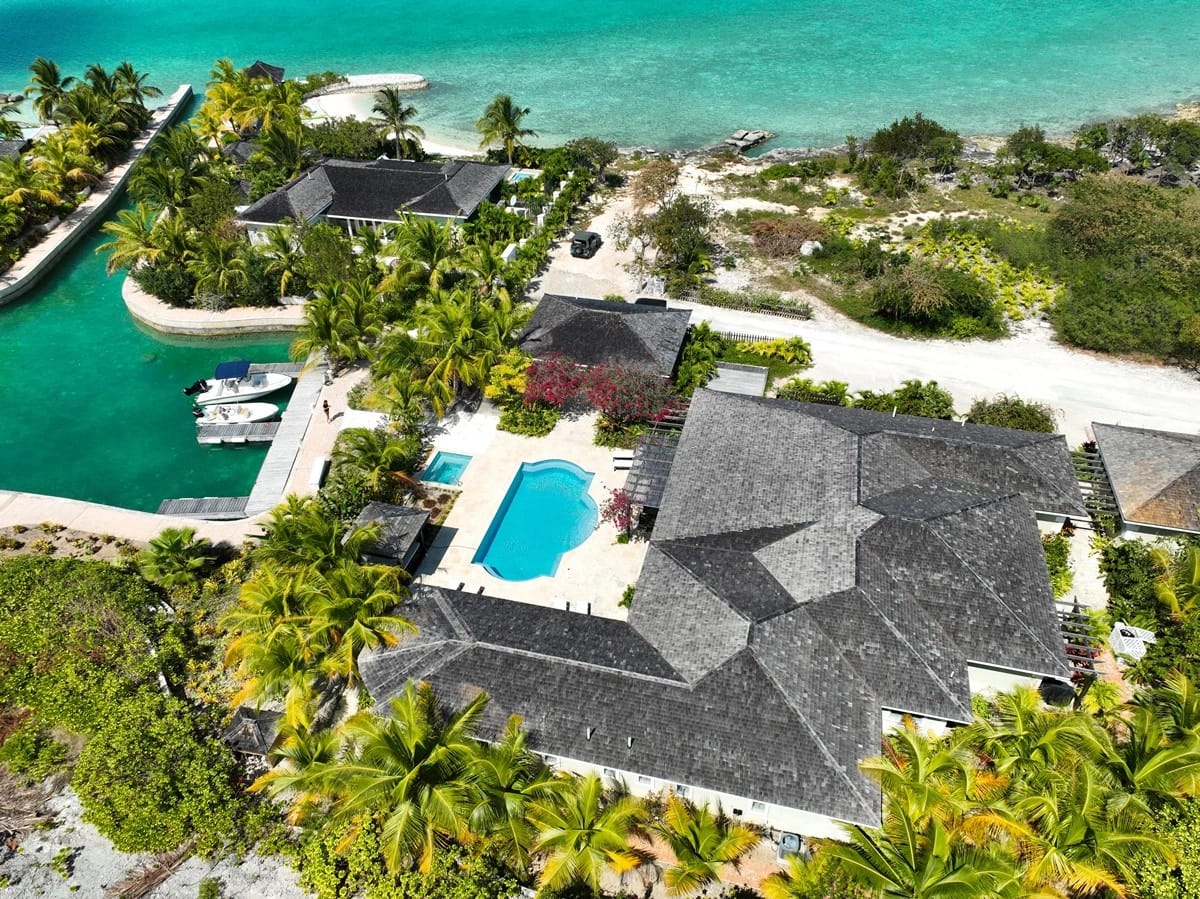 Tropical villa with pool, ocean.