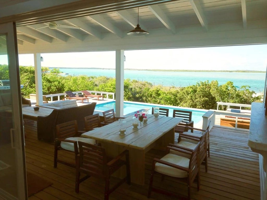 Outdoor dining area with ocean view.