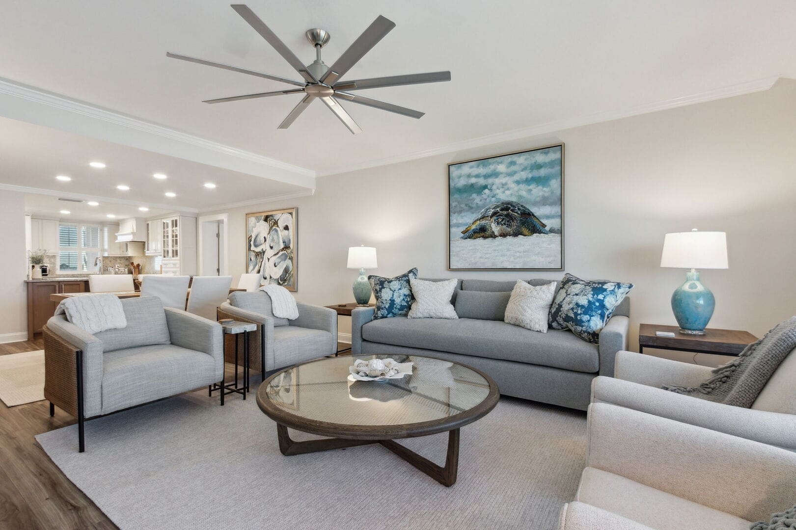 Modern living room with ceiling fan.