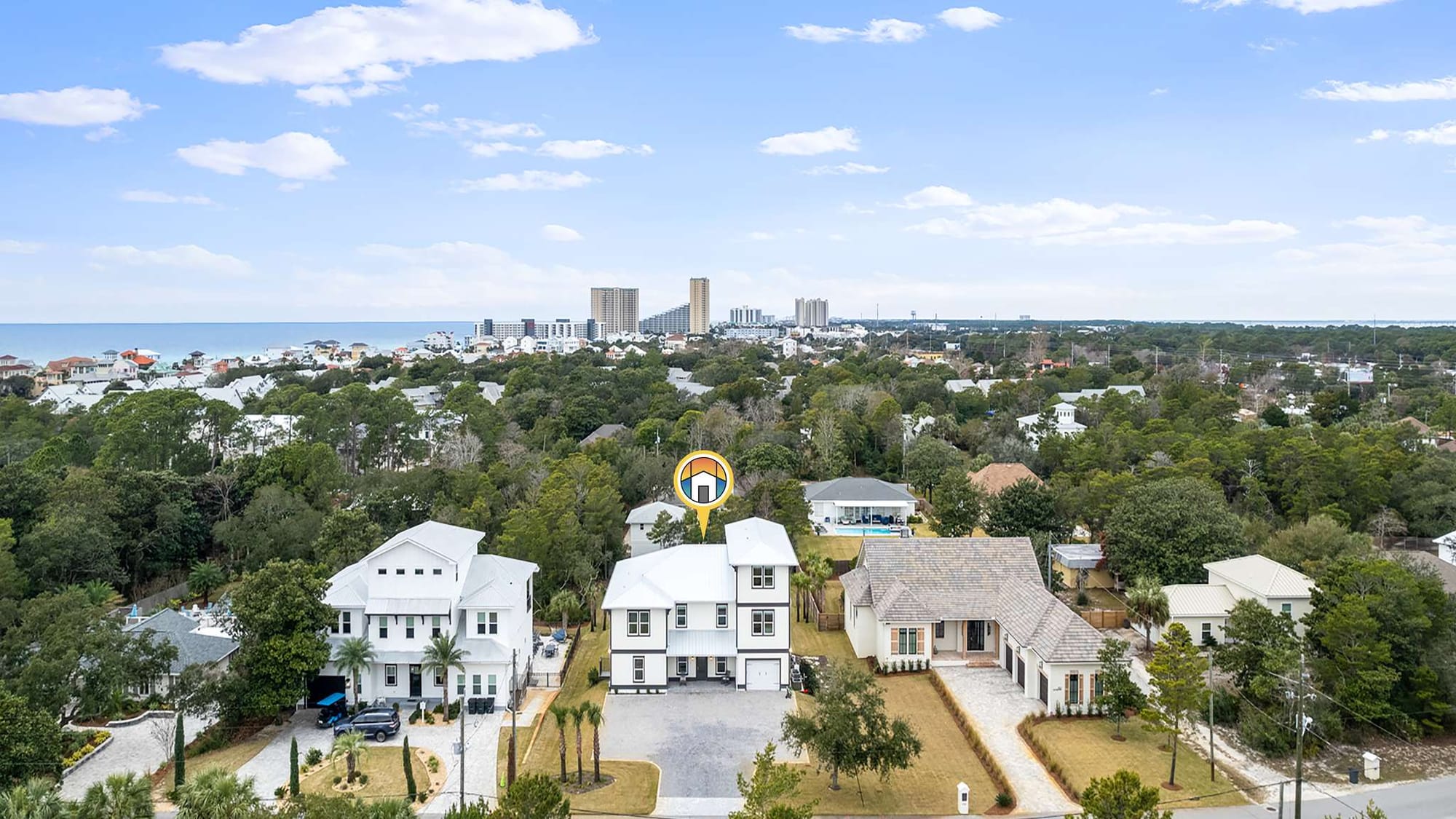 Suburban neighborhood with distant coastline.