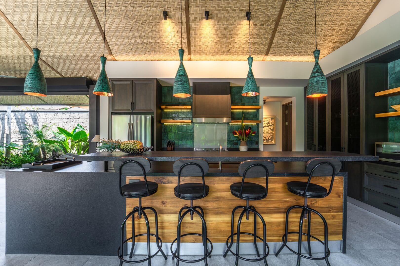 Modern kitchen with bar stools.