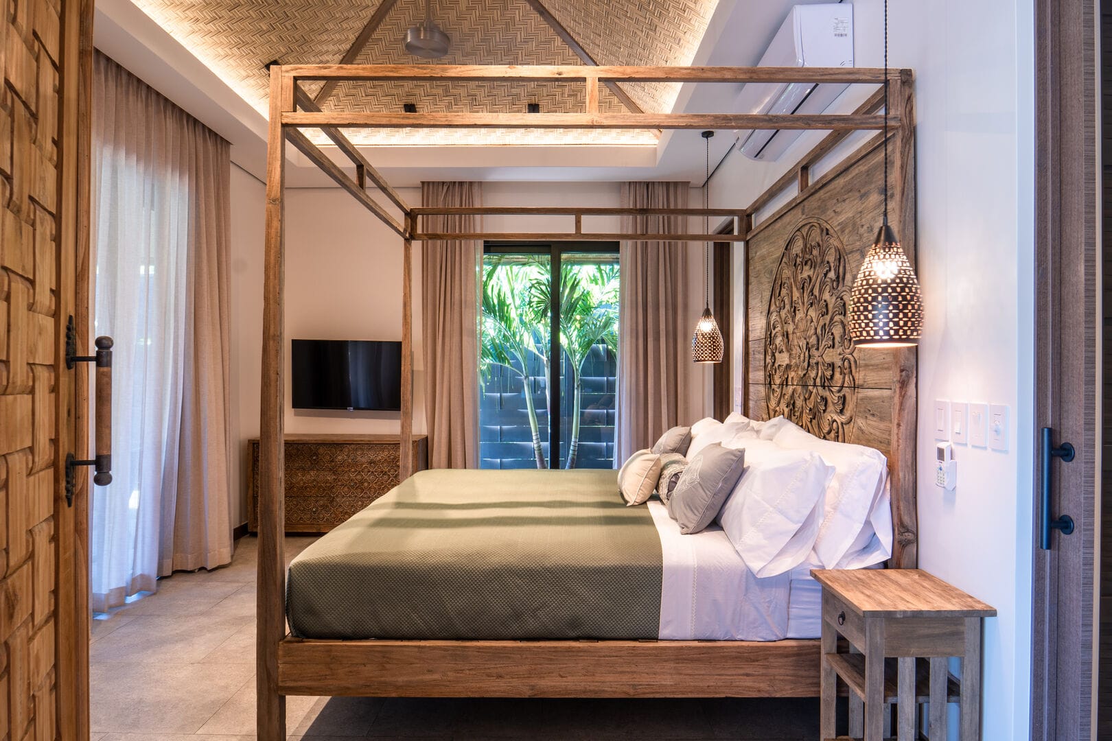 Rustic bedroom with canopy bed.