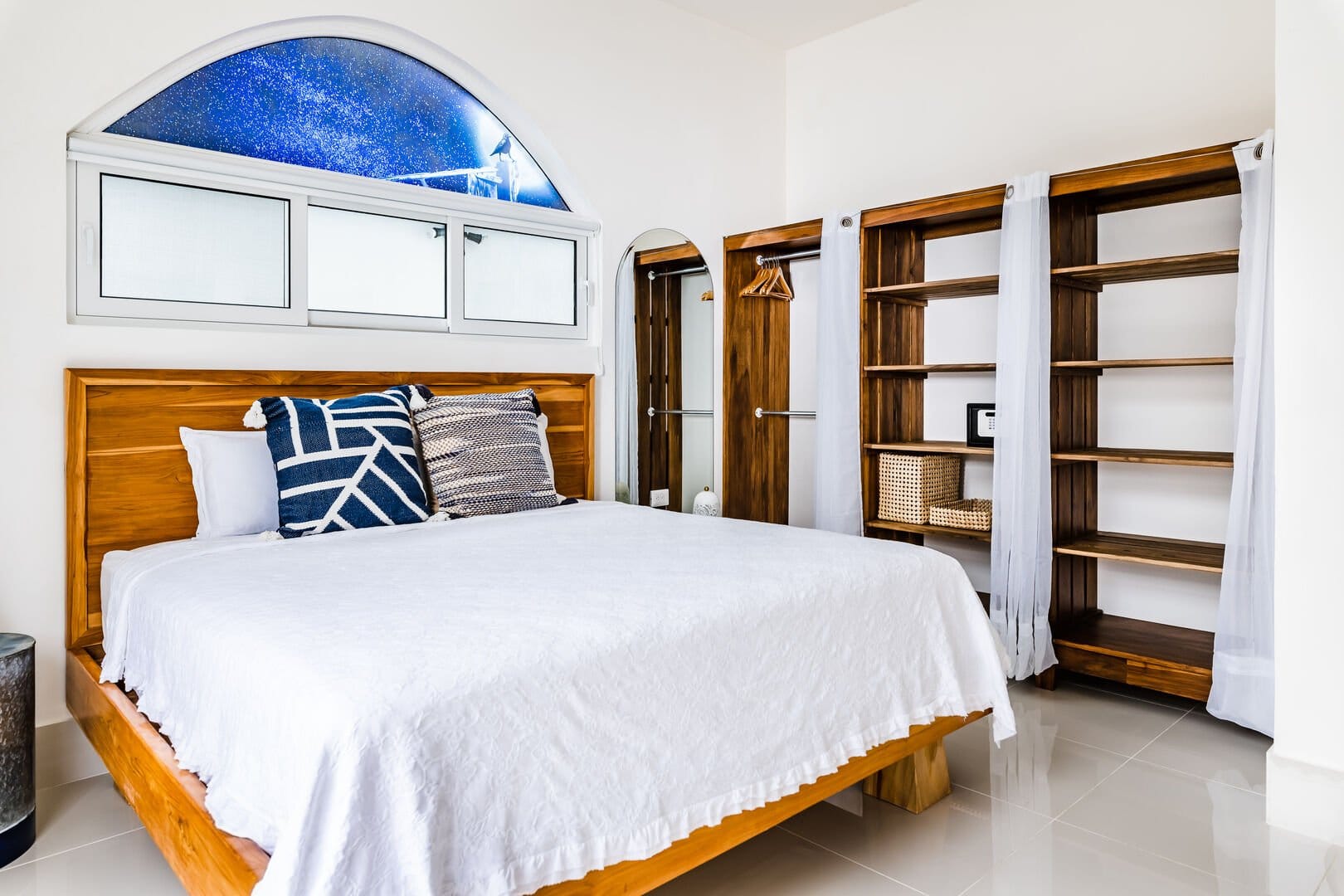 Modern bedroom with wooden furniture.
