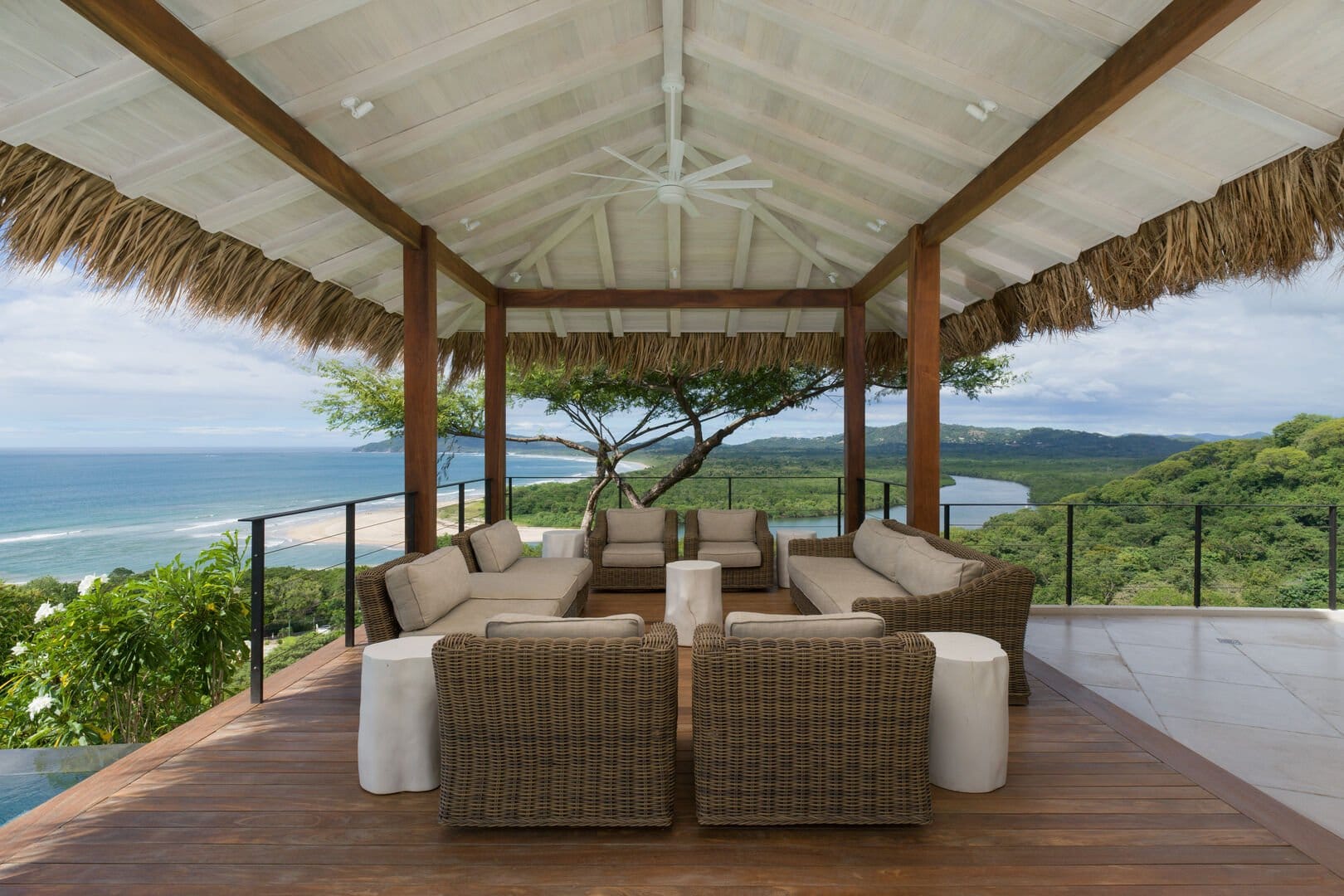 Open-air lounge with ocean view.