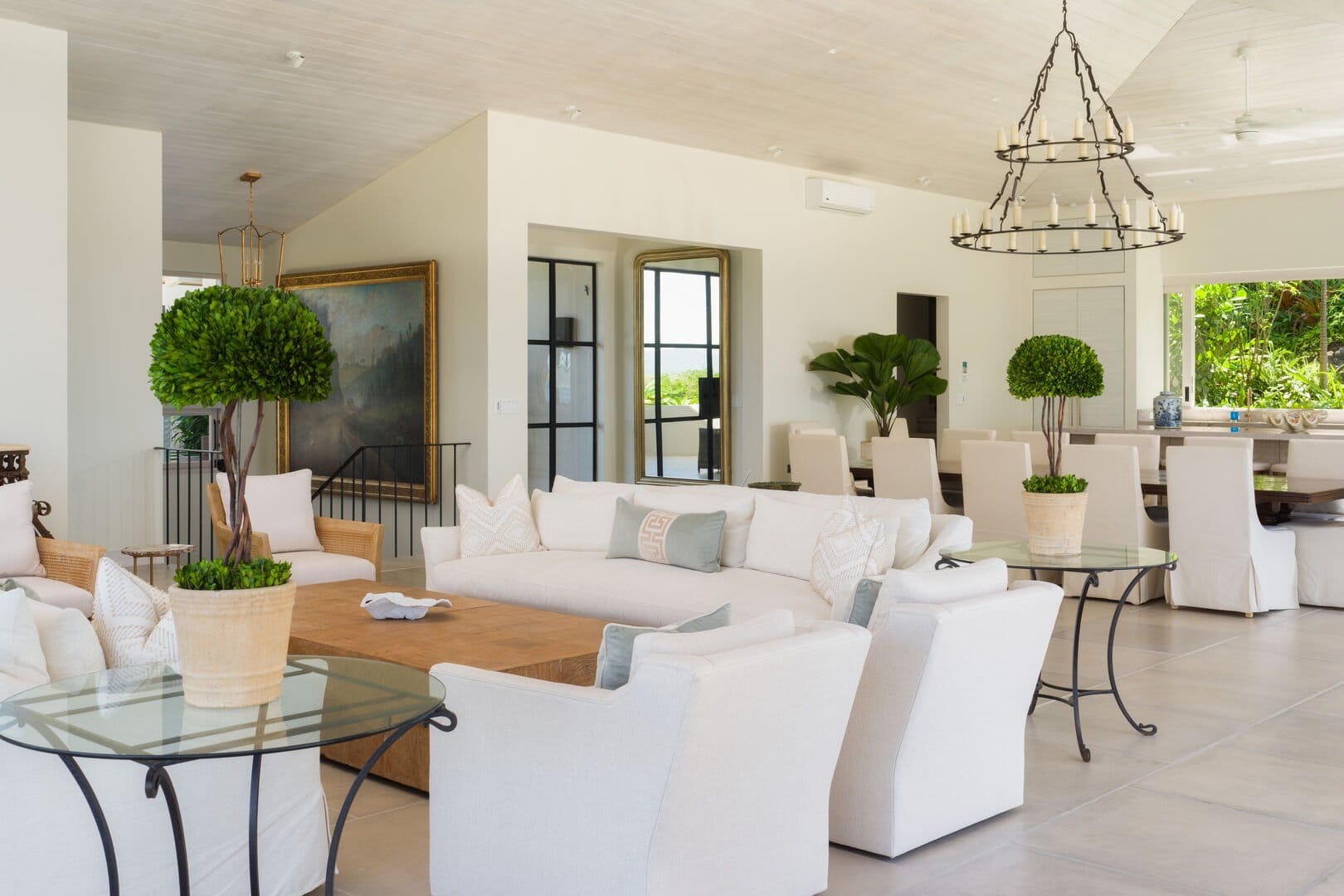 Spacious living room with greenery.