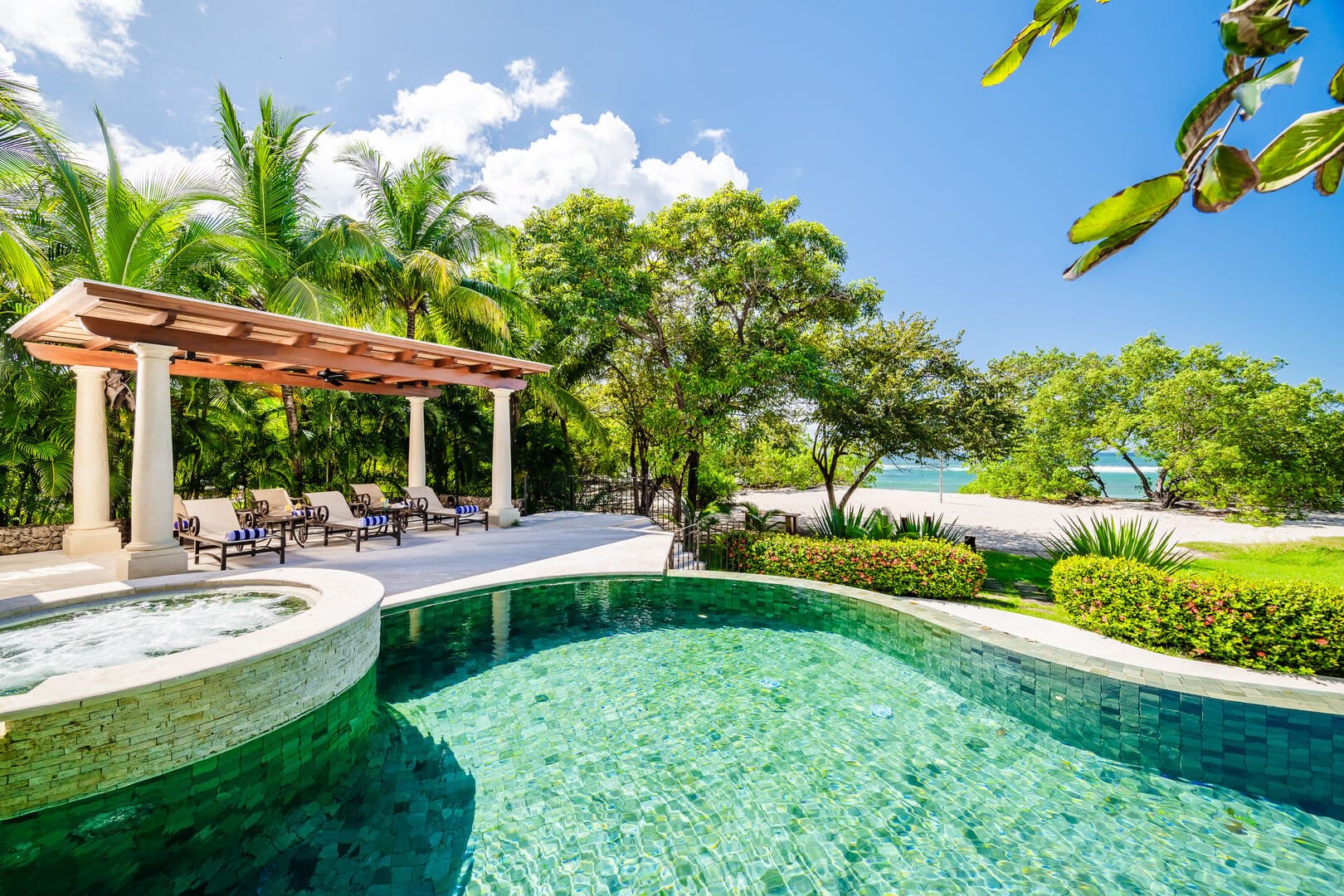 Tropical poolside by the beach.