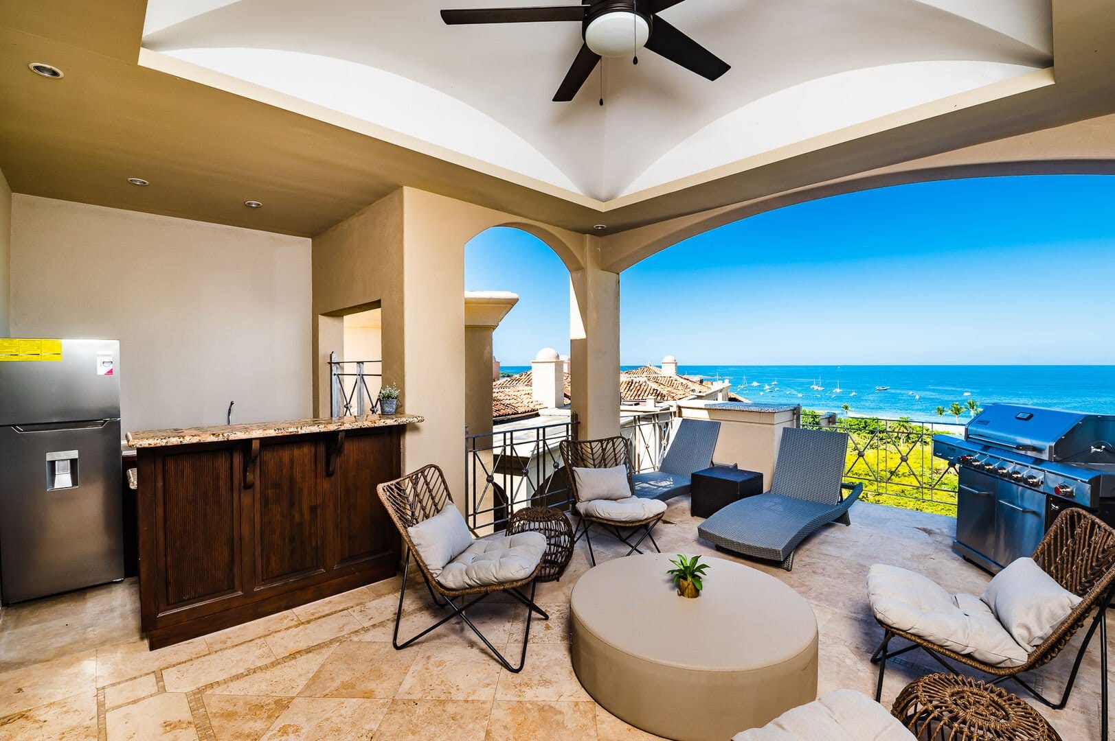 Outdoor patio with ocean view.