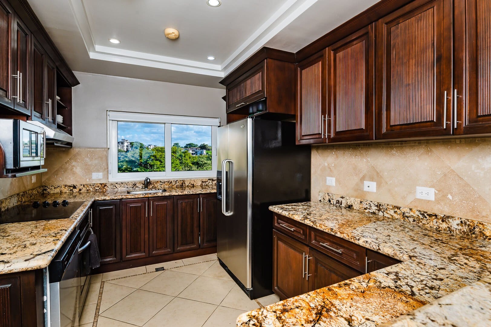 Modern kitchen with wooden cabinets.