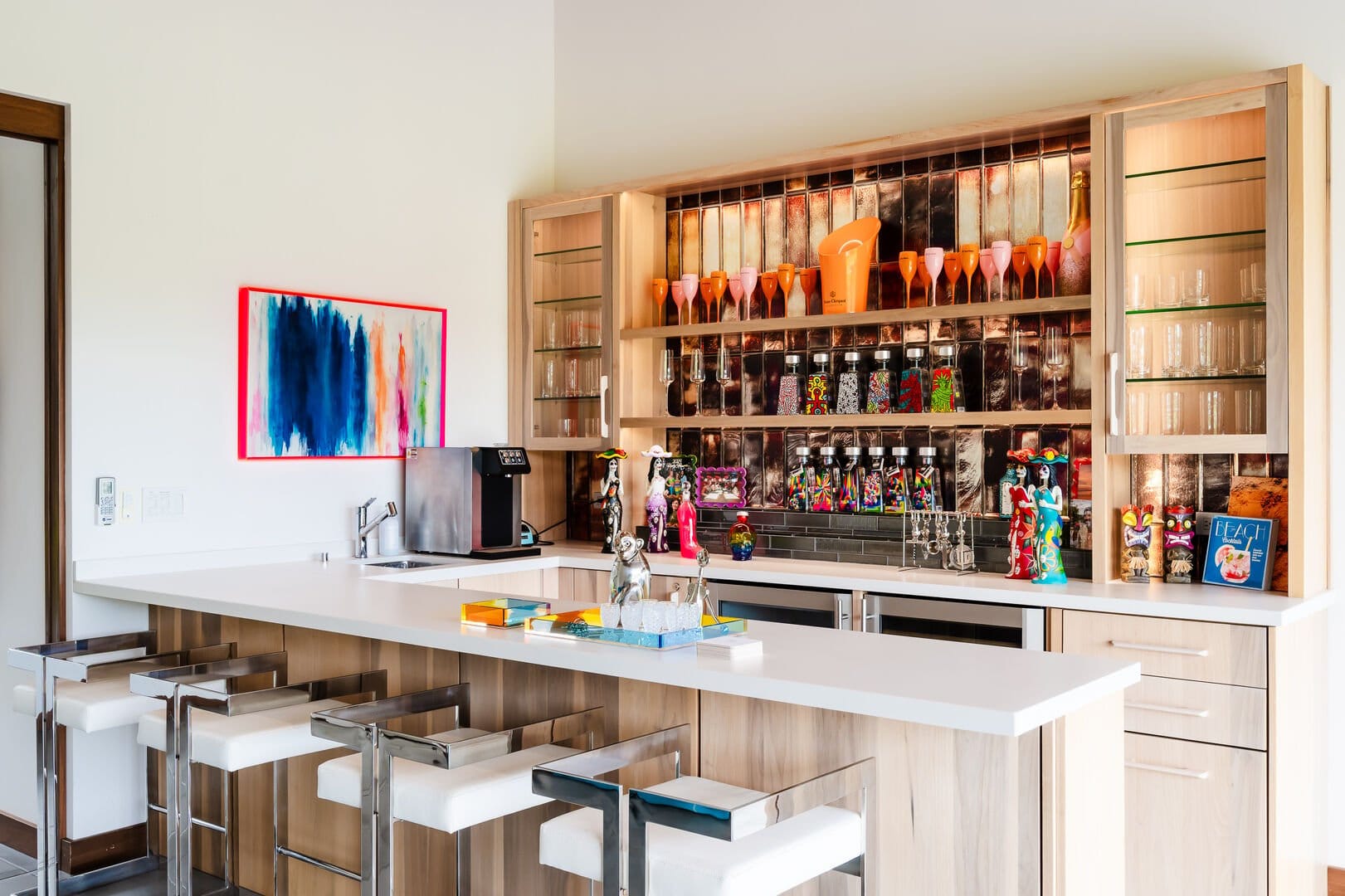 Modern bar with colorful decorations.