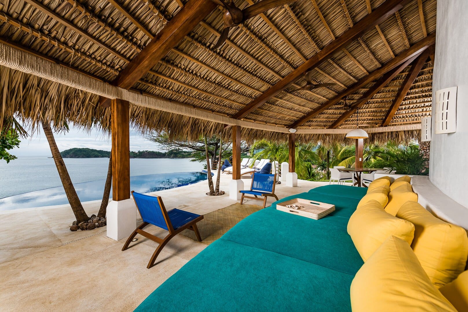 Beachside lounging area with ocean view.