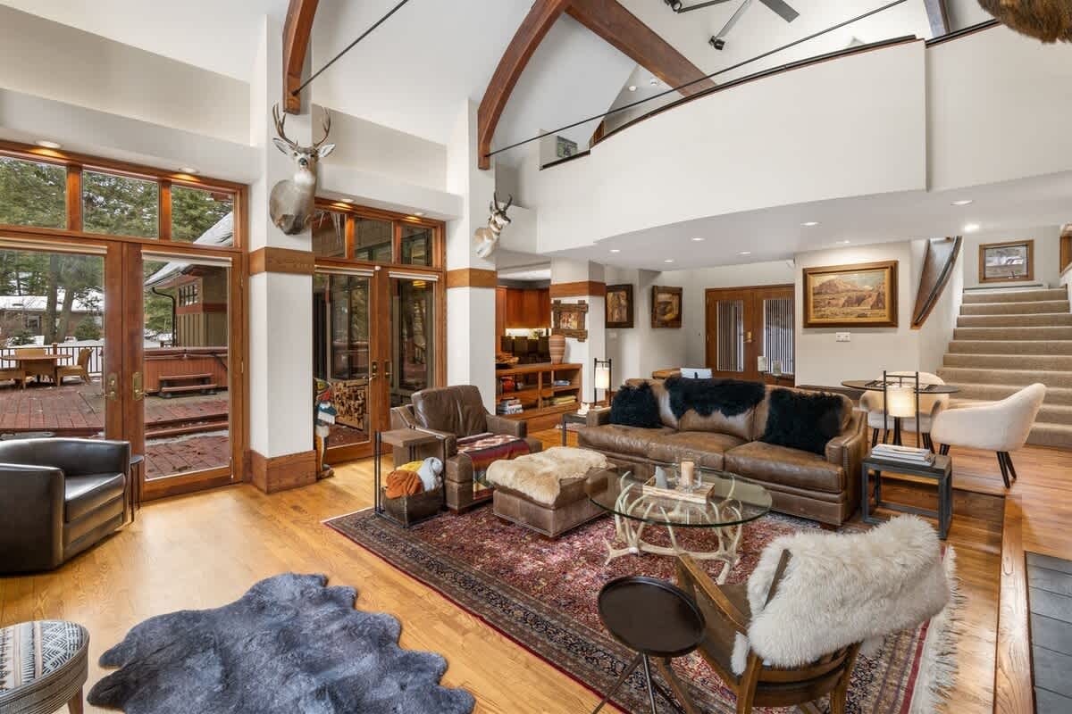 Spacious living room with rustic decor.