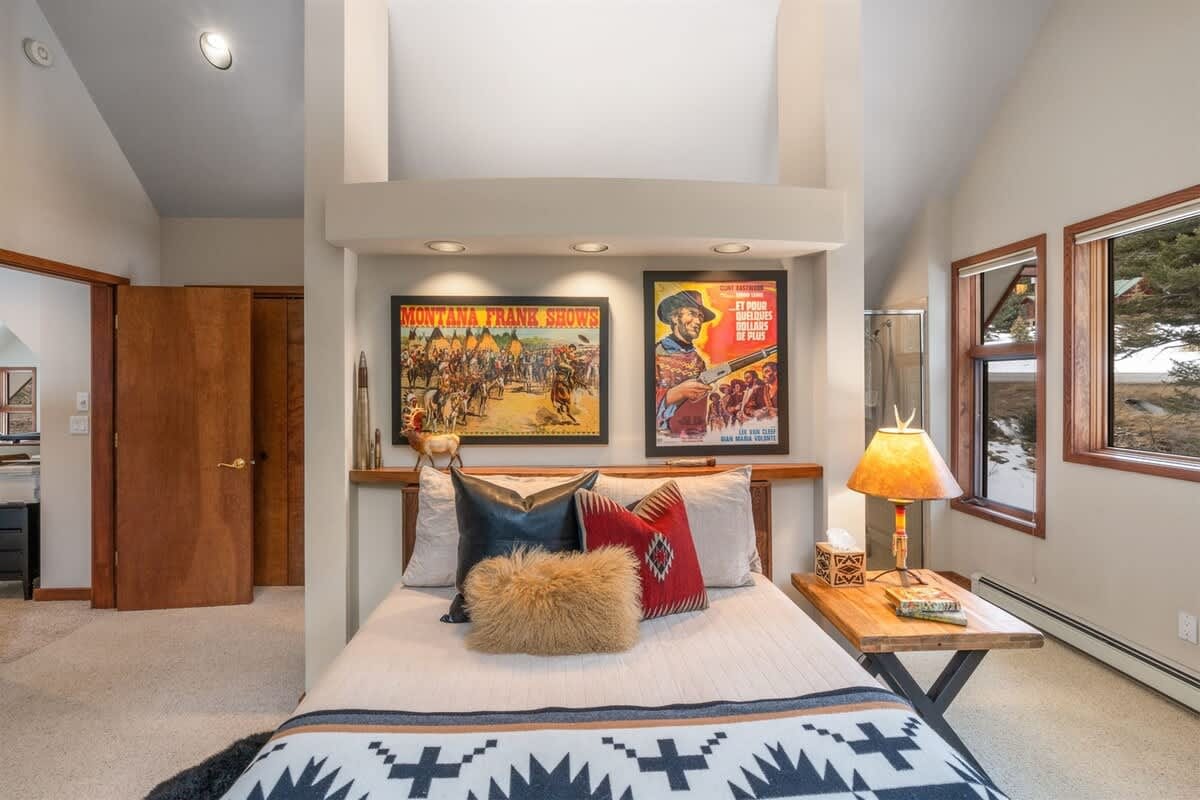 Cozy bedroom with vintage posters.
