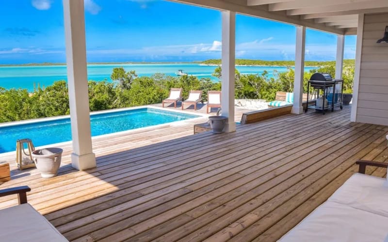 Poolside patio with ocean view.