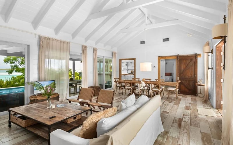 Cozy coastal living room with dining.