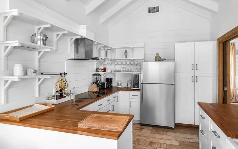 Modern kitchen with wooden countertops.
