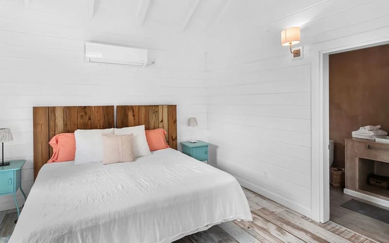 Bright bedroom with rustic style elements.