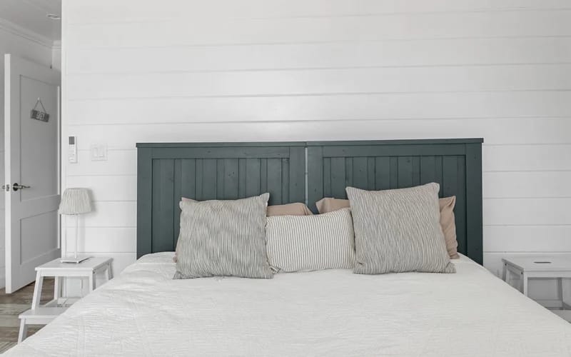 Minimalist bedroom with large bed.