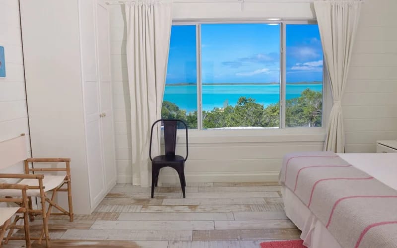 Bright room with ocean view window.