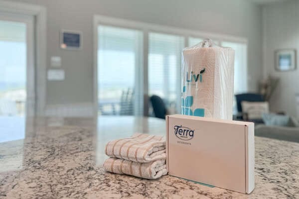 Tissues and towels on countertop.
