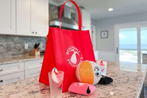 Red bag and beach-themed items.