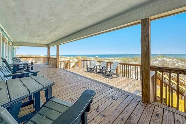 Wooden deck overlooking the beach.