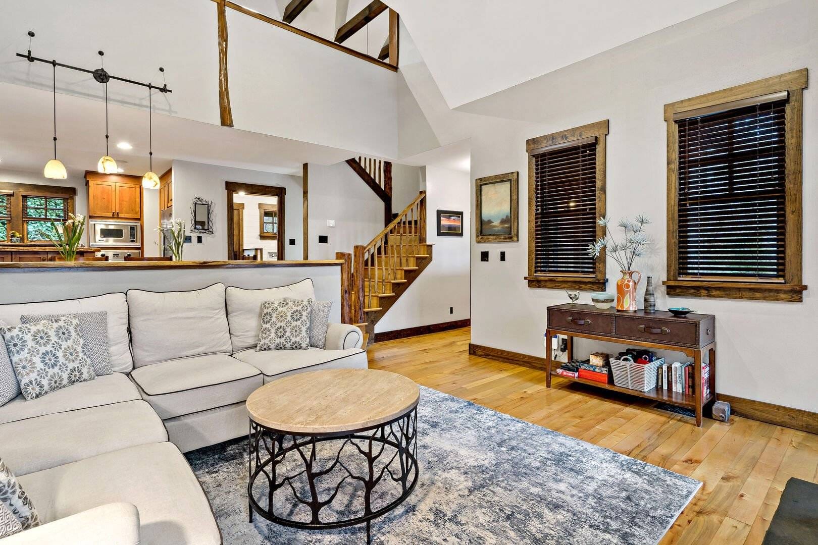 Modern living room with staircase.