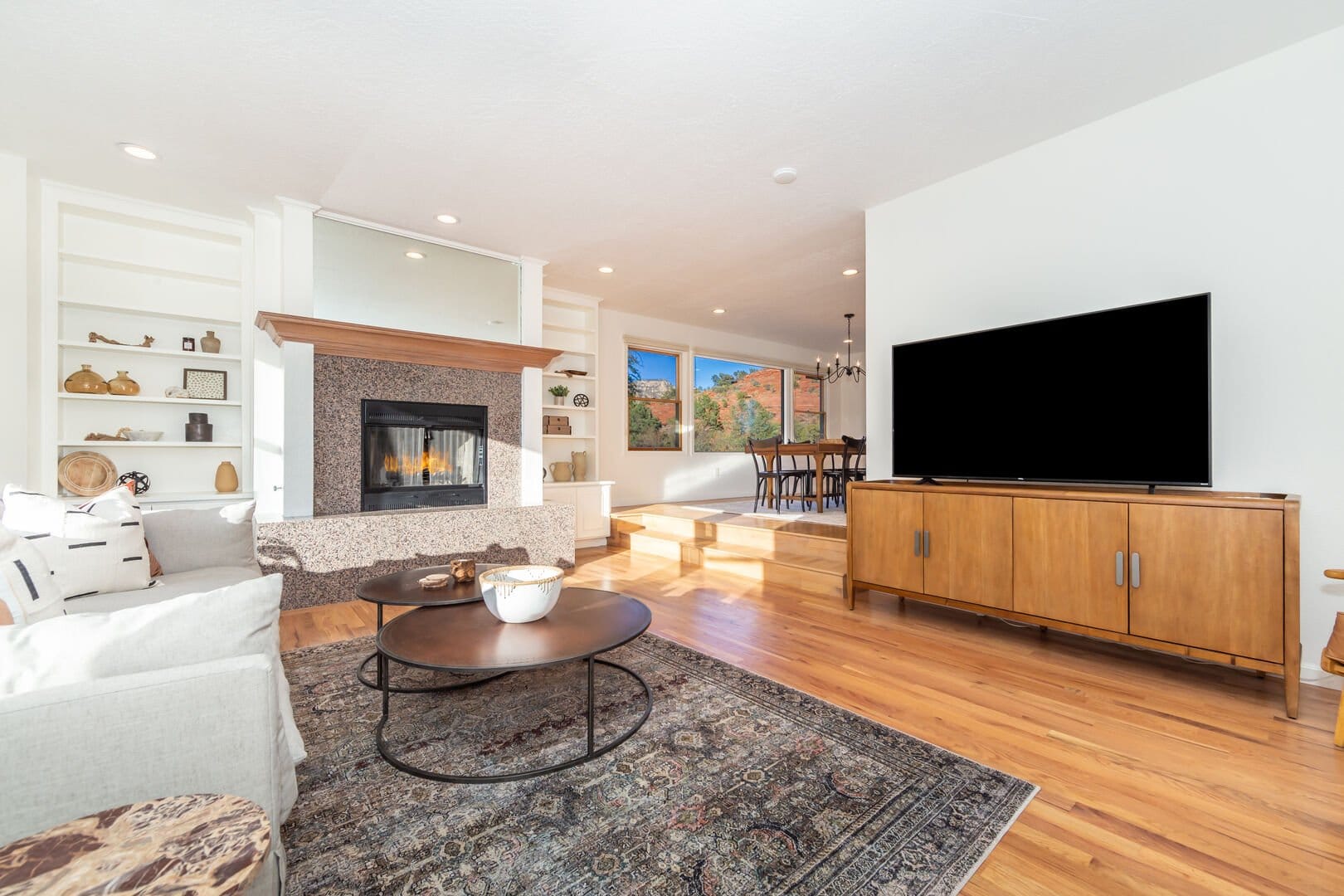 Modern living room with fireplace, TV.