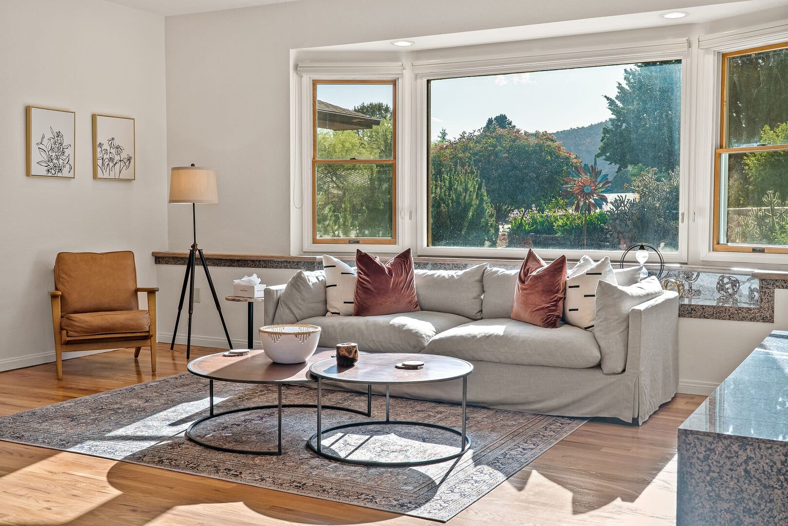 Bright living room with large window.