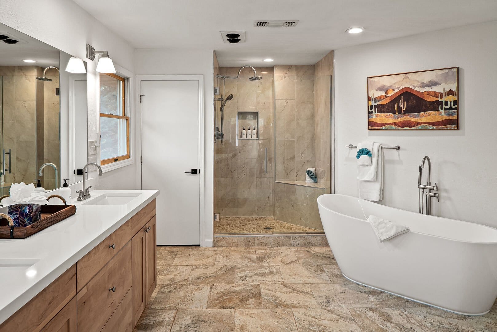 Modern bathroom with shower and bathtub.