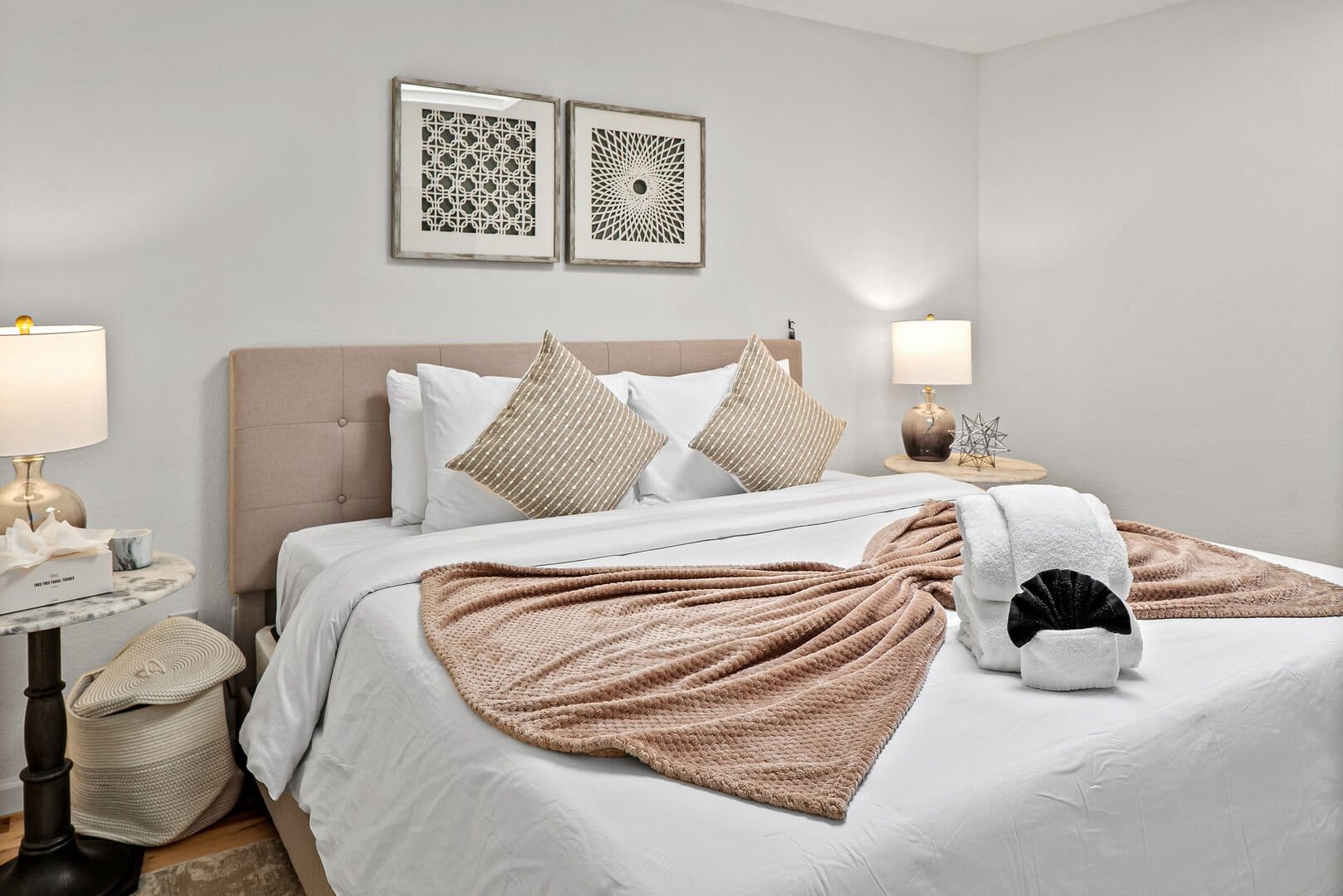 Cozy bedroom with decorative pillows.