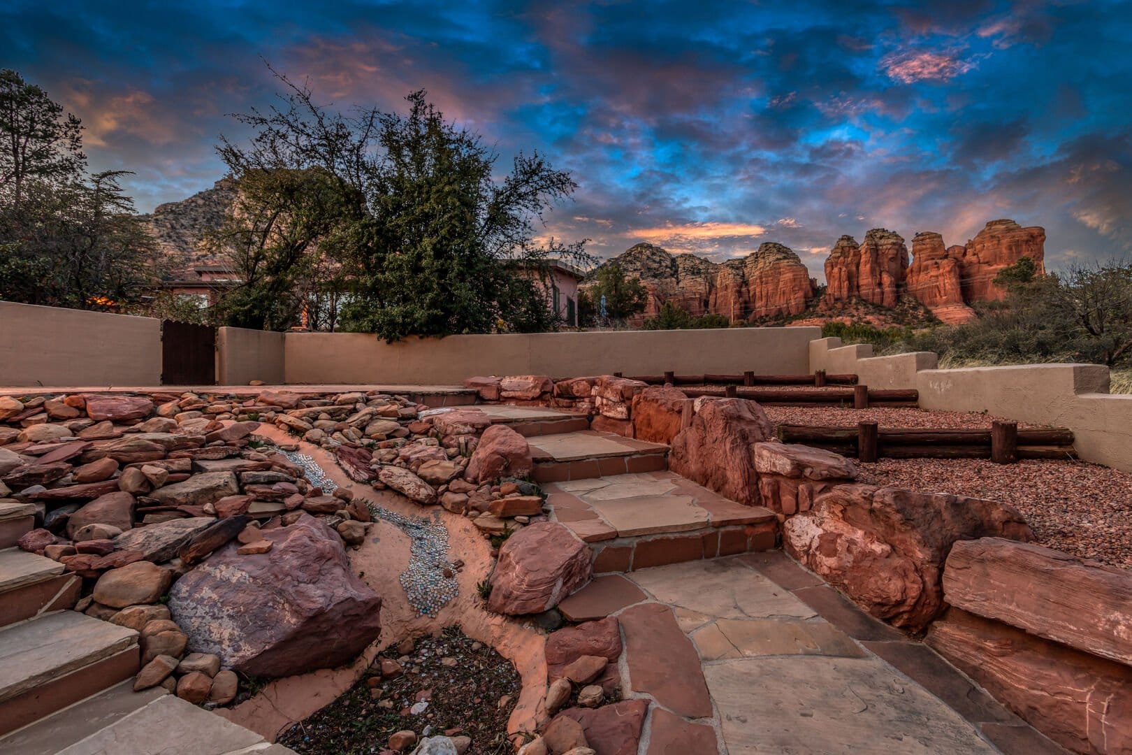 Rocky landscape with vibrant sunset sky.