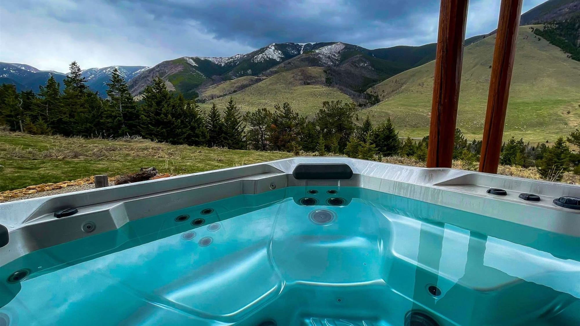 Hot tub with mountain view.