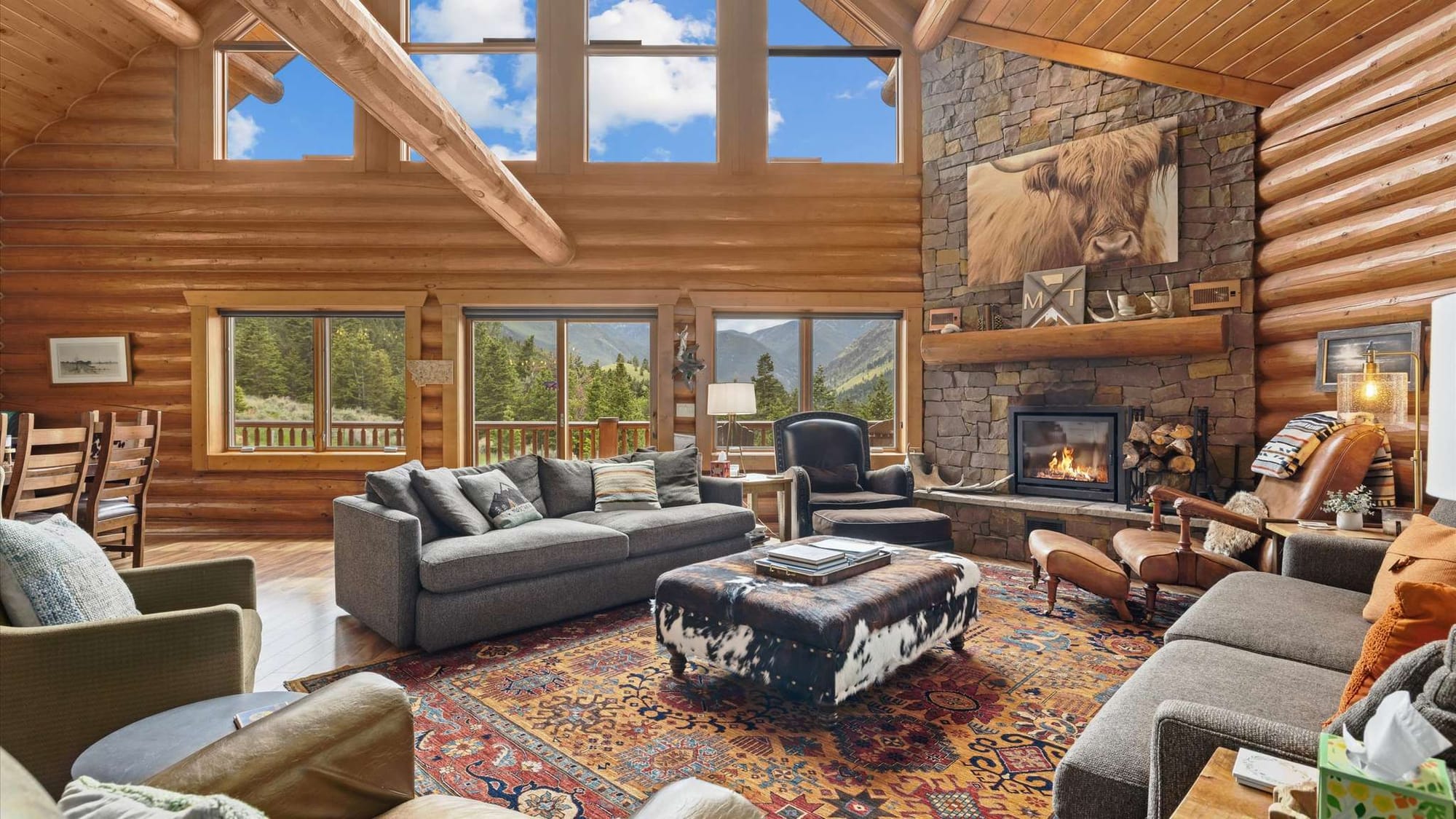 Rustic living room with mountain view.