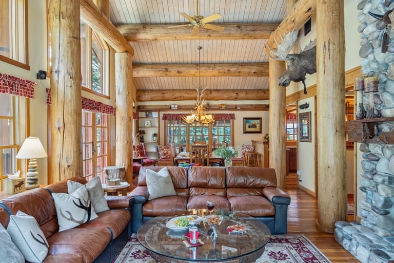 Rustic living room with leather sofas.